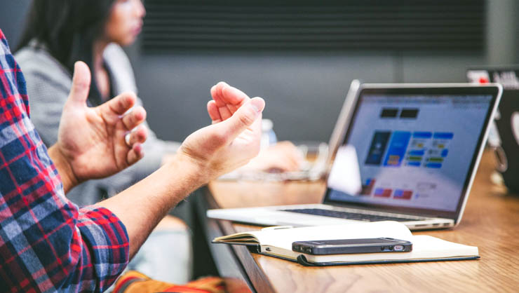 Person explaining something in a meeting