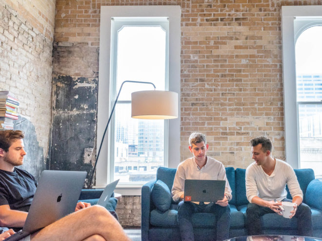 Workers working on the couch together