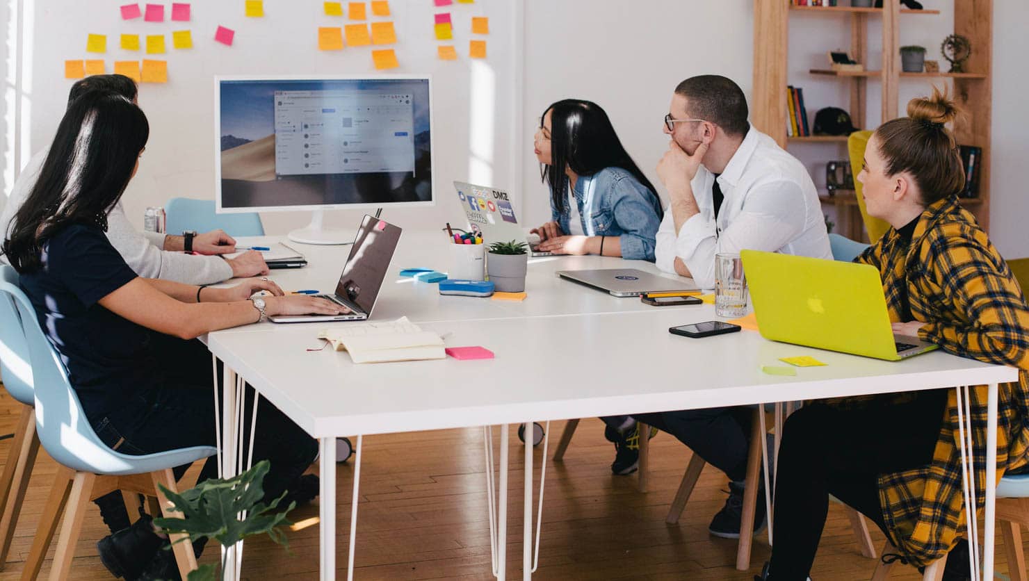 Group of people working together at a table